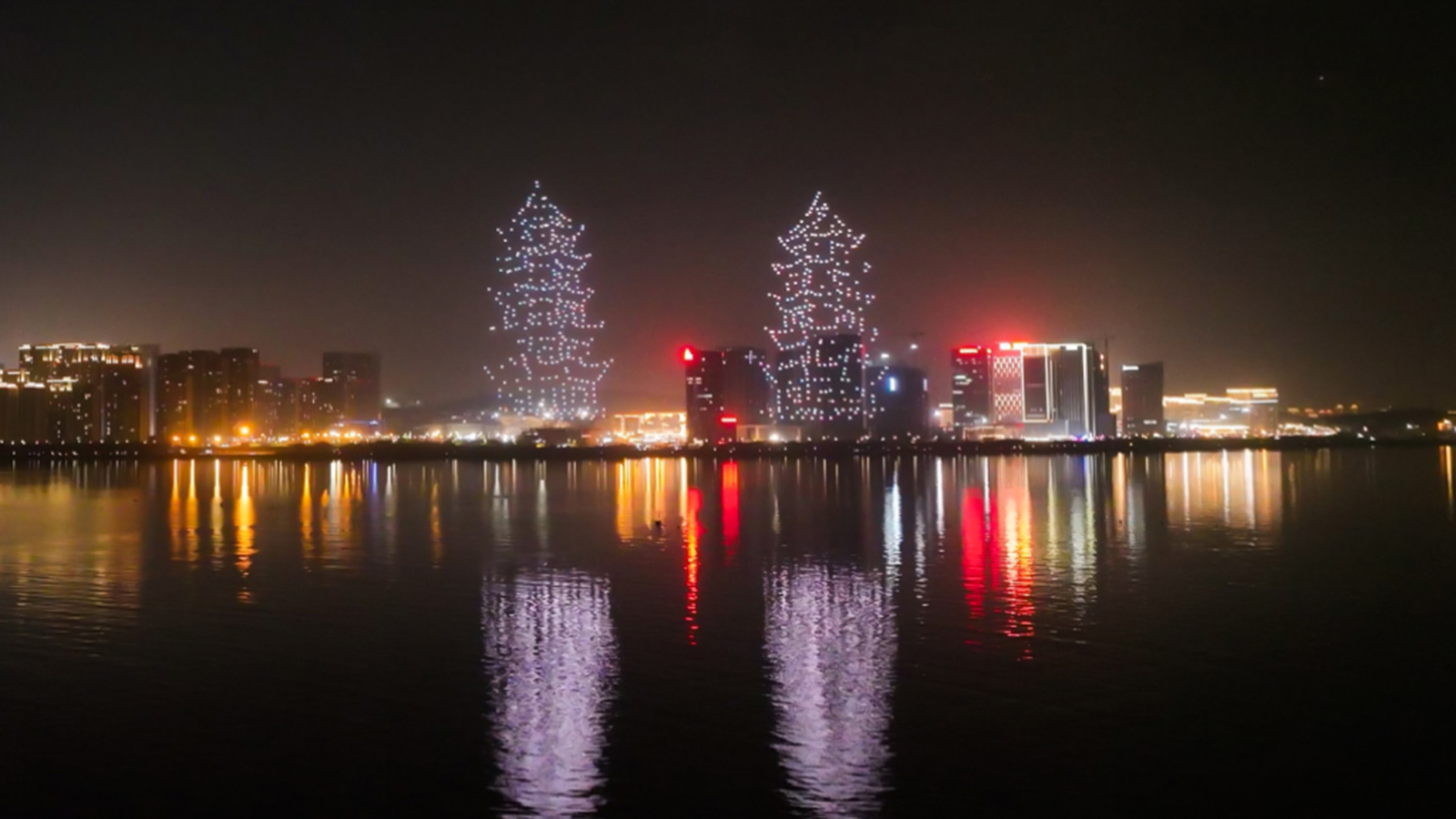 Remote Cross-sea Heterogeneous Drone Light and Fireworks Show